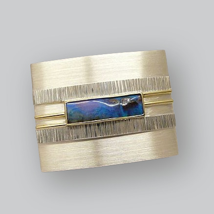 Gürtelschnalle · Silber & Gelbgold mit Boulderopal